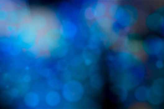 blue bokeh blur lights defocused background for design