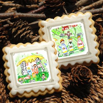 Christmas cookies, decorated with children's drawings Magi and Nativity scene