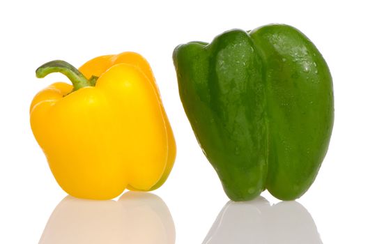 Two fresh peppers on white background.