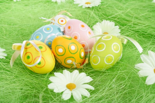 Painted Colorful Easter Eggs on green Grass