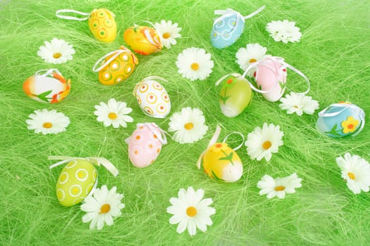 Painted Colorful Easter Eggs on green Grass