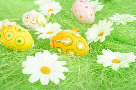 Painted Colorful Easter Eggs on green Grass