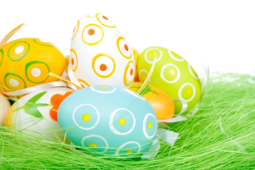 Painted Colorful Easter Eggs on green Grass