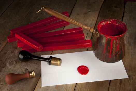 Red wax staff with stamp, pot and letter