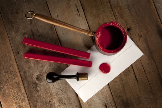 Red wax staff with stamp, pot and letter