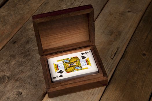 Playing cards in a wooden presentation box 