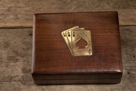 Playing cards in a wooden presentation box 