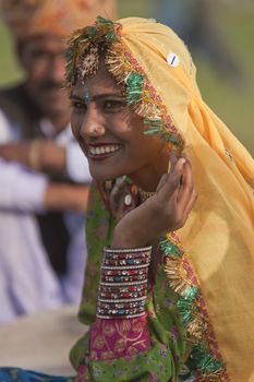 Indian woman laughing during a festival in Jaipur, Rajasthan, India.