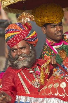 Colorfully dressed Indian man at the elephant festival in Jaipur, Rajasthan, India.