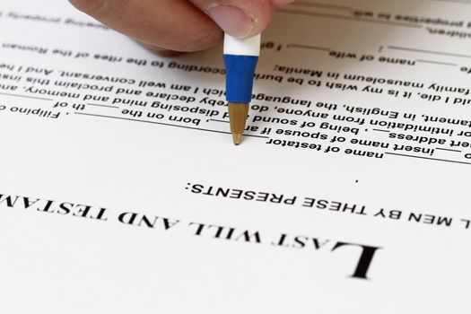 Macro shot of Last will and testament during signing.