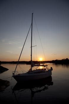 Sailboat silhouette with a beautiful sunset 