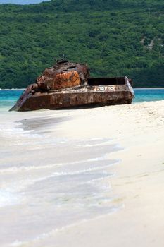 The old rusted and deserted military tank of Flamenco beach on the Puerto Rican island of Culebra.