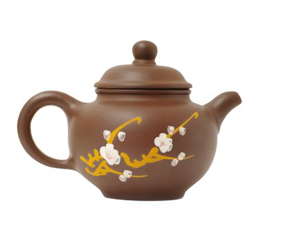 brown ware teapot with sakura pattern isolated