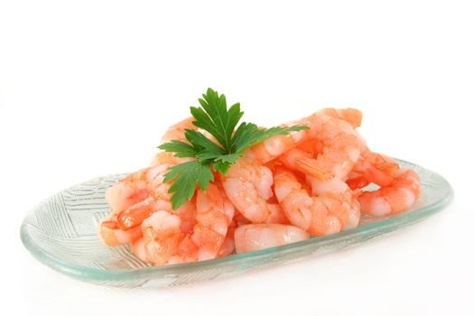 fresh shrimp with parsley on a white background
