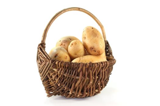 fresh potatoes in a wicker basket
