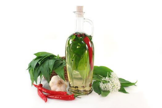a bottle of wild garlic oil on a white background