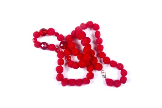 Red beads on white background