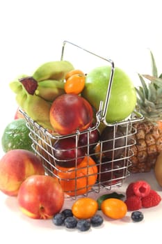 Mix of native and exotic fruit in a Shopping basket