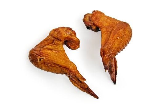 Two smoked chicken wings on a white background