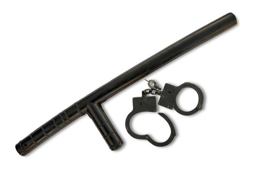 Police baton with handcuffs  isolated on white with clipping path