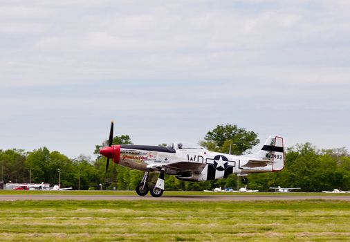 P-51 Mustang air force plane taking off at airshow