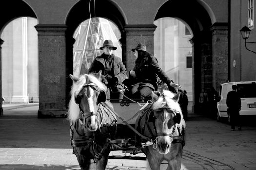 Horses and carriage in city center of Salzburg, Austria