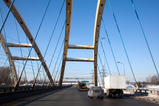 A modern highway bridge. View through the car window.