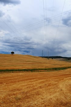 High-voltage Lines In Tuscany In Inclement Weather