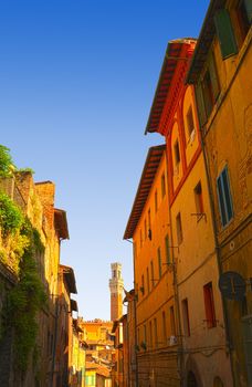 Narrow Alley With Old Buildings In Italian City of Siena