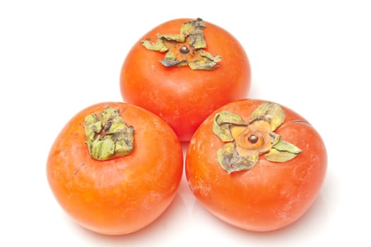 Orange persimmons isolated on white background