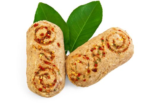 Two frozen meat patties, two green leaf lemon isolated on a white background