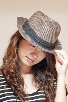 Asian stylish woman wearing hat