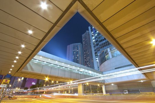 Busy traffic under the bridges in Hong Kong at night