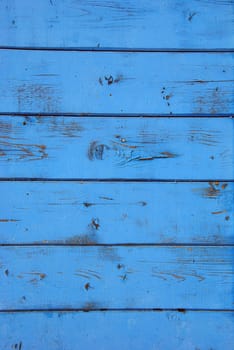 Blue grunge background of old bee hive wall.