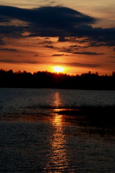 Early spring sunrise over the lake. Unforgettable view.