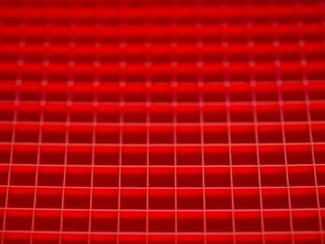 close up of red squares pattern background blurred