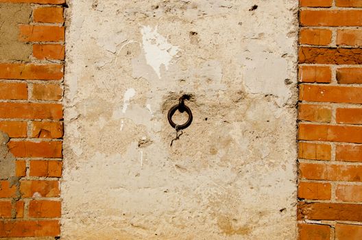 Wall made of red brick and concrete. Architectural background and textures.