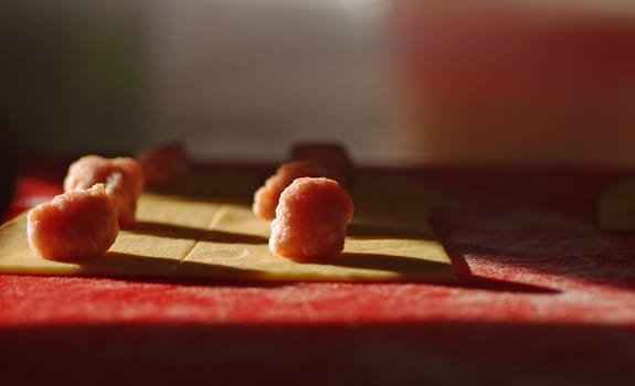 Making tortellini, following the traditions in Modena