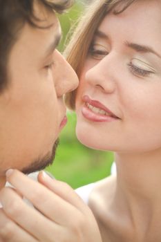 Portrait of young beautiful bride and groom