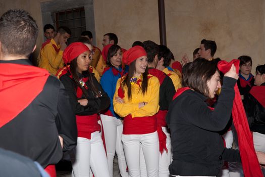 GUBBIO, ITALY - MAY15; Crowd of young people gather for Festa Dei Ceri celebrations in street of Gubbio Italy, May 15 2011. Large crowds celebrate this historic event annually.