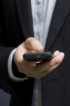 Business man using smart cell phone 
