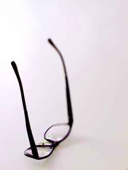 close up of fallen eye glasses
