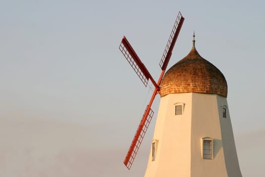 Old windmill with colors from a sunset
