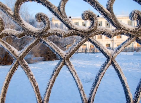 Snow-clad railing,winter landscape,freezing patterns, winter