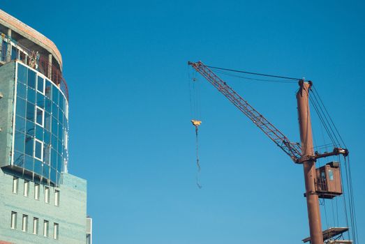 Lifting crane on building of the new house.The Building technology