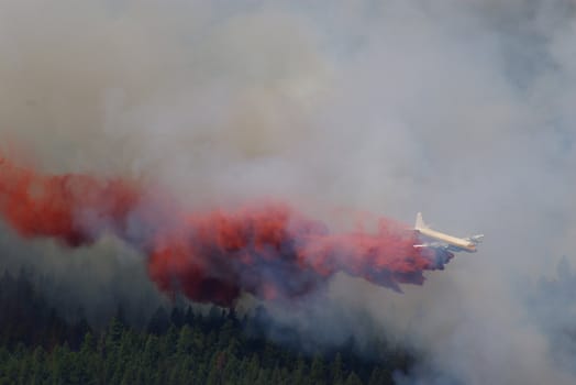 Forest fire fighting in the mountains using an aircraft