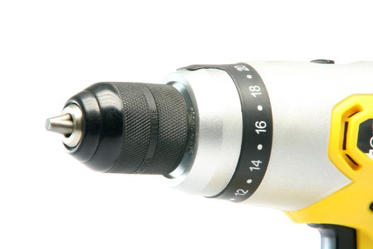 front detail of  yellow rechargeable drill isolated on white background industrial tools