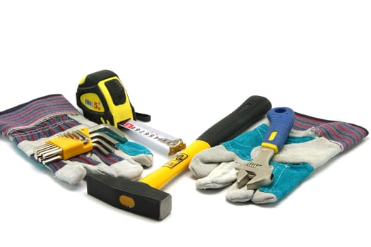hardware tools hammer wrench  gloves Socket Screw Wrench and meter measure isolated on white background with copy space