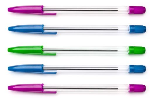 Five writing pens in a variety of colours arranged horizontally over white