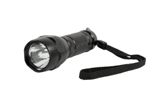 A small LED torch, close-up isolated on a white background.